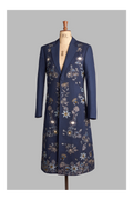 Navy blue coat with floral embroidery on a mannequin against a gray background