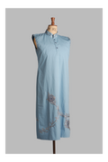 Light blue sleeveless dress with embroidery on a mannequin against a gray background