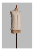 White vest on a mannequin against a gray background