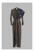 grey jumpsuit with belt and detachable collar accent on a grey background