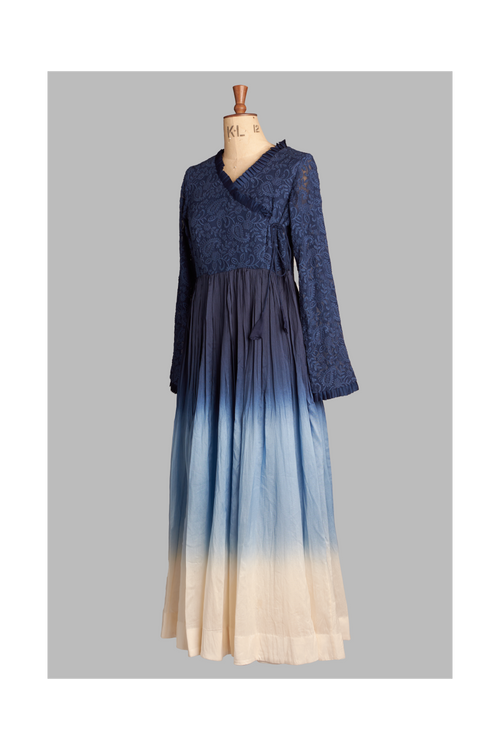 Navy blue outfit with gradient effect on a mannequin against a gray background